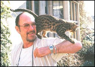 Ian Anderson shares a moment with one of his Bengal Cats, and is working hard to gain important recognition and help for the smaller endangered wild cats of the world.