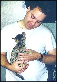 Wes has his hands full with these beautiful but lively kittens!